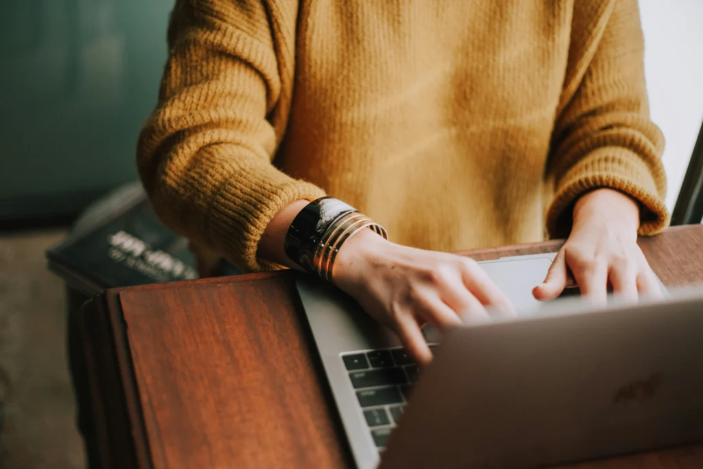 An analyst working at a laptop